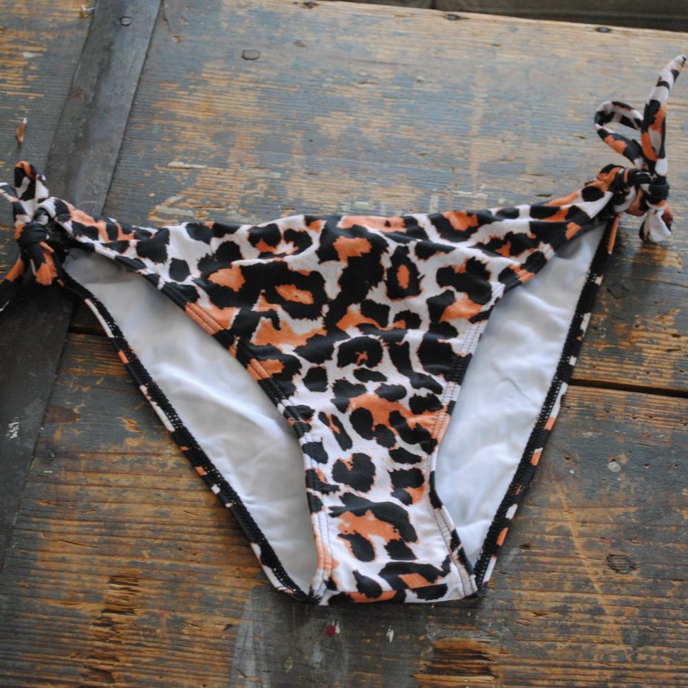 NEW WITH TAGS  Leopard bikini bottoms with ties on side